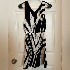 Black and white racer back dress. Elastic at the waist. Size S